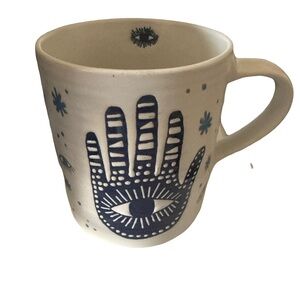 Ceramic Mug with Hand and Eye Design